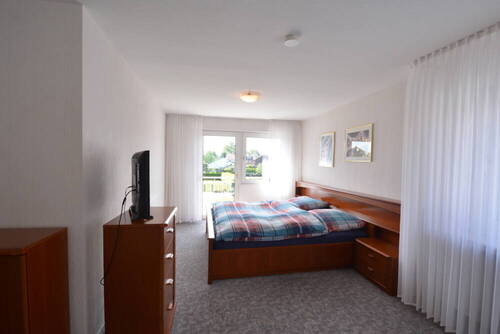 Schlafzimmer Anbau mit Blick in den Garten - 