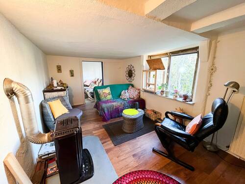 Wohnzimmer - Einfamilienhaus mit 170,00 m² in Hilchenbach zum Kaufen