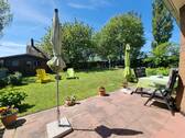 Terrasse / Grundstücksansicht - 6 Zimmer Mehrfamilienhaus, Wohnhaus in Putgarten
