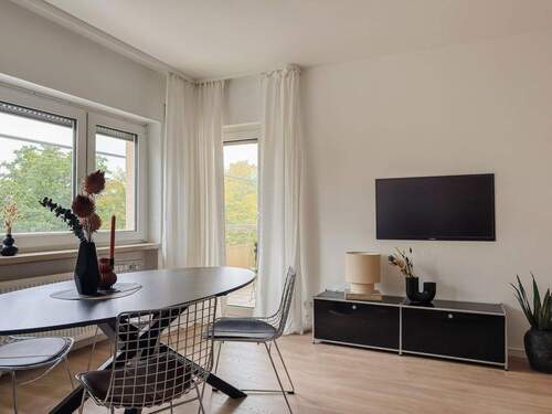 Wohnzimmer - Etagenwohnung mit 58,80 m² in Heusenstamm zum Kaufen