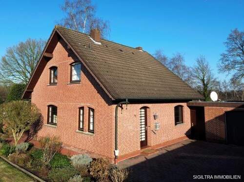 Bild 2 - 4 Zimmer Mehrfamilienhaus, Wohnhaus zum Kaufen in Friesoythe