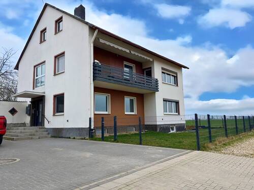 Außenansicht - Traumhaftes Mehrfamilienhaus in idyllischer Feldrandlage