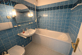 Badezimmer mit Wanne - 3 Zimmer Etagenwohnung in München