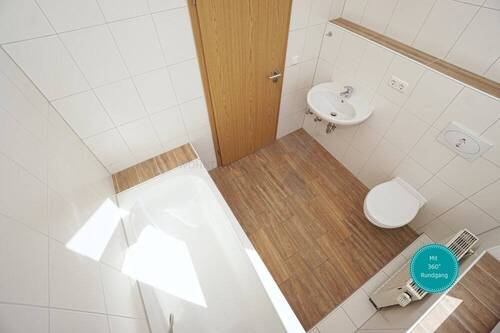 Startbild - Moderne 2,5-Zimmer-Wohnung mit großer Wohnküche und Tageslichtbad in zentraler Lage