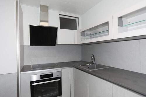 Küche mit Einbauküche - 