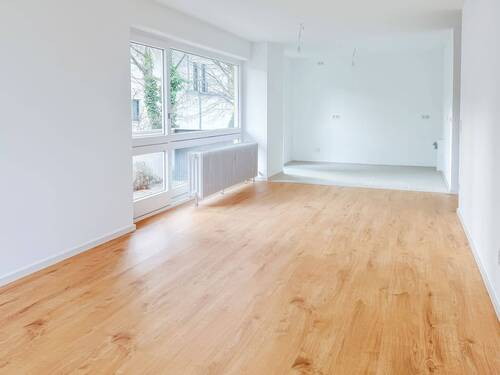 Wohnzimmer / Küche - Ihr neues Zuhause - Stilvolle, kernsanierte 2-Zimmer-Wohnung mit zwei Balkonen in Harlaching