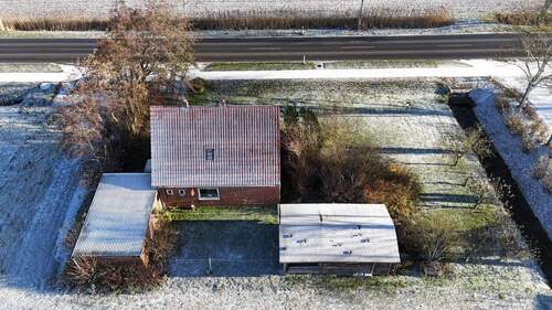 Drohnenbild Grundstück - 4 Zimmer Einfamilienhaus in Friedrichskoog