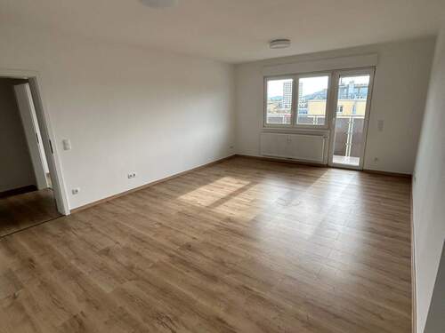 Wohn-/Essbereich - Familienfreundliche 4-Zimmer Wohnung mit Balkon in Würzburg Sanderau