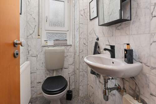 Gäste-WC - Einfamilienhaus mit 106,20 m&sup2; in Oyten zum Kaufen