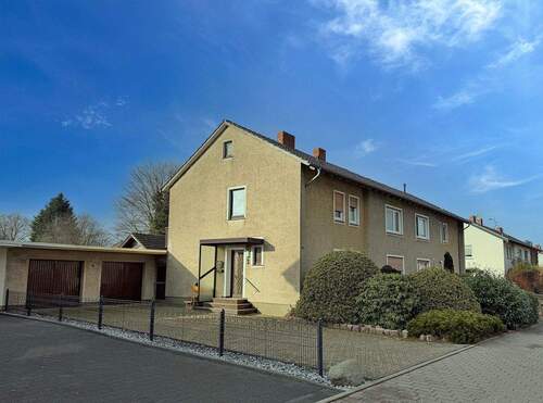 Ansicht vorne - Zweifamilien-Doppelhaushälfte in 32130 Enger-Dreyen