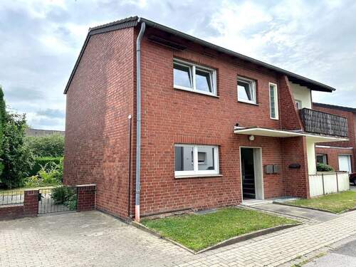 Hausansicht Vorderseite - Mehrfamilienhaus, Wohnhaus mit 134,00 m&sup2; in Rommerskirchen zum Kaufen