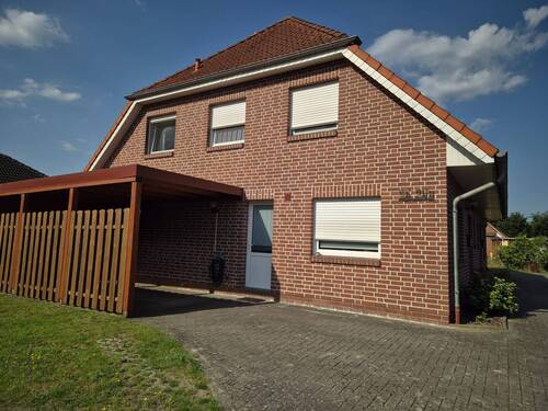 Seiteneingang - exklusive DHH m. Carport in gewachsener Siedlung im Saterland OT Sedelsberg