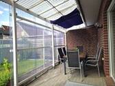 überdachte Terrasse m. Windschutz - 