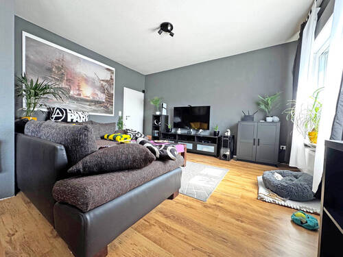 Wohnzimmer - 4 Zimmer Einfamilienhaus zum Kaufen in Schüttorf