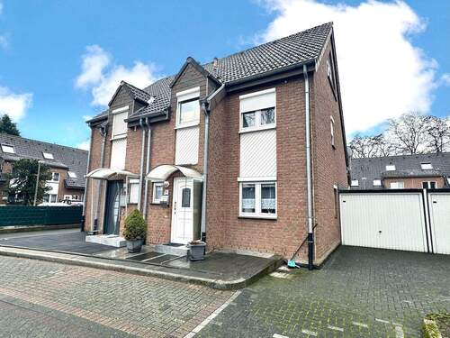 Hausansicht Vorderseite - 5 Zimmer Doppelhaushälfte zum Kaufen in Neuss