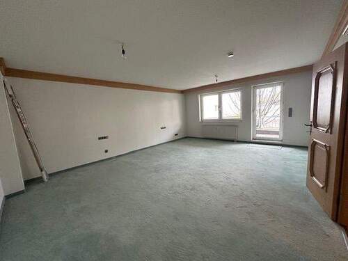 Wohnzimmer - Terrassenwohnung mit 73,00 m&sup2; in Wehrheim zum Kaufen