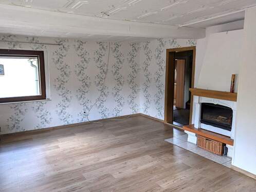 Wohnzimmer mit Kamin - 