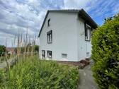 Hausansicht Seite - Mehrfamilienhaus, Wohnhaus zum Kaufen in Northeim