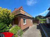 Einfahrt Garage - Einfamilienhaus mit 120,00 m&sup2; in Schneverdingen zum Kaufen