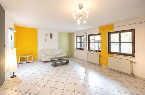 Wohnzimmer EG - Mehrfamilienhaus, Wohnhaus mit 210,00 m&sup2; in Freimann zum Kaufen