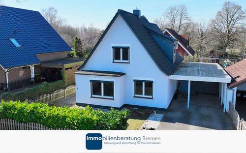 Titelbild - Bezugsfertig! Modernes Einfamilienhaus mit Garten und Carport