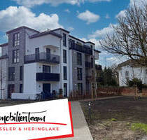 Neubau-Erstbezug in Halstenbek: Stilvolle 2-Zimmer-Wohnung mit Balkon ins Grüne