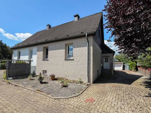 Bild 1 - Doppelhaushälfte mit Charme, Potenzial und großem Garten in Lengerich