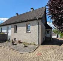 Doppelhaushälfte mit Charme, Potenzial und großem Garten in Lengerich