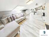 Wohnzimmer mit Blick zur Küche - Moderne 2 Zimmer Wohnung mit unverbaubarem Ausblick, Einbauküche und Stellplatz in Nieder-Olm