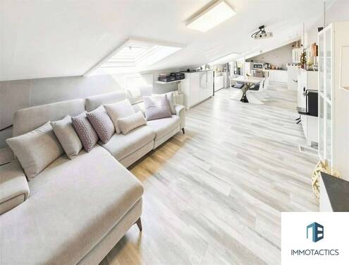 Wohnzimmer mit Blick zur Küche - Moderne 2 Zimmer Wohnung mit unverbaubarem Ausblick, Einbauküche und Stellplatz in Nieder-Olm