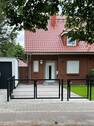 Hausansicht von der Straße - Unbefristeter Erstbezug - DHH mit 191 m2, Garage und Südwestgarten in Top Lage von Kleinmachnow