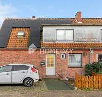 Doppelhaushälfte mit solider Basis und Südgarten - Büdelsdorf