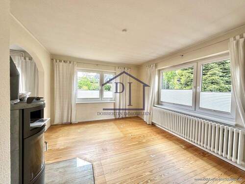 Wohnzimmer - 5 Zimmer Einfamilienhaus zum Kaufen in Sierksdorf