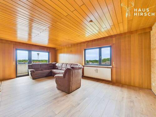 Wohnzimmer - Attraktive 4,5-Zimmer-Wohnung mit Potenzial in Waghäusel-Wiesental