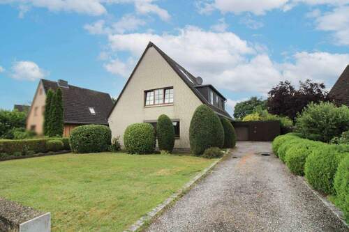 Außenansicht - Charmante Erdgeschosswohnung mit Terrasse, Garten und Garage - in ruhiger Lage