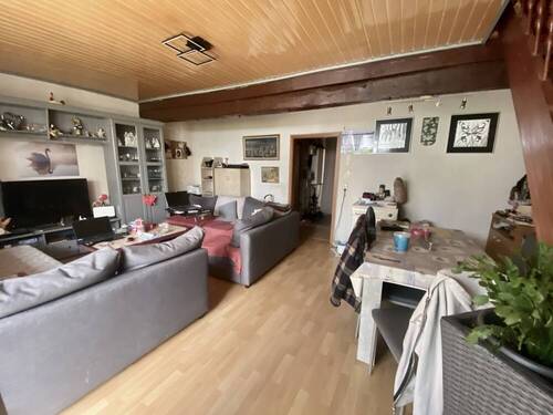 Wohn- und Esszimmer mit Zugang zur Terrasse - 