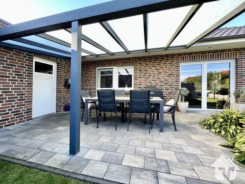 Garten mit überdachter Terrasse - 