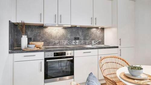 Küche Musterwohnung - + Traumhafter Zweitbezug am Ziegelsee +