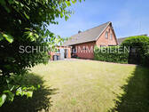 Giebelseite Garten - 7 Zimmer Einfamilienhaus zum Kaufen in Bockhorn