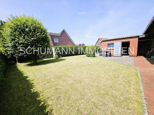 Ansicht Garage_Garten - 7 Zimmer Einfamilienhaus in Bockhorn