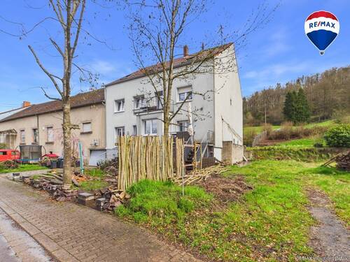 REMAX Immobilien DeLux Haus in Brotdorf zu verkaufen - 7 Zimmer Einfamilienhaus zum Kaufen in Merzig / Brotdorf