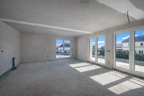 Wohnzimmer - Exklusive 3-Zimmer-Gartenwohnung im Effizienzhaus 40 - Ausstattung noch wählbar!