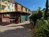 Garage als Gartenhaus mit überdachter Terrasse - 