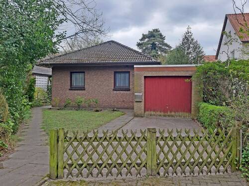 Vorderansicht (Straßenseite) - Charmantes Einfamilienhaus mit Garage in familienfreundlicher Lage