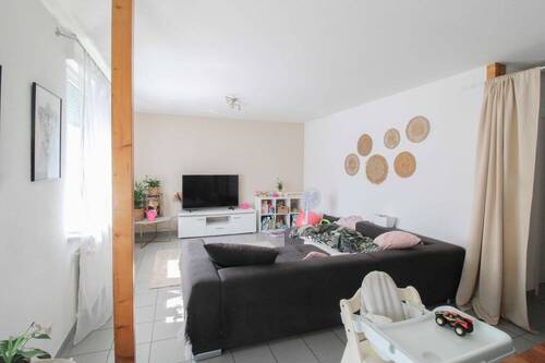 Wohnzimmer Wohnung EG - 7 Zimmer Mehrfamilienhaus, Wohnhaus in Graben-Neudorf