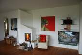 Wohnzimmer mit Heizkamin - 