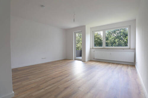 Wohnzimmer - 1 Zimmer Etagenwohnung in Bremen