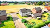 Blickrichtung Feld - 7 Zimmer Mehrfamilienhaus, Wohnhaus in Alfhausen