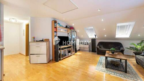 Wohnzimmer 2 - Gut vermietete 1,5-Zimmerwohnung mit offenem Wohnkonzept und Gartenmitnutzung