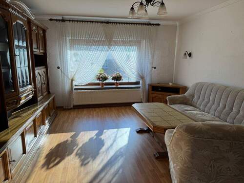 Wohnzimmer Vorderhaus - Einfamilienhaus mit 180,00 m&sup2; in Korschenbroich zum Kaufen